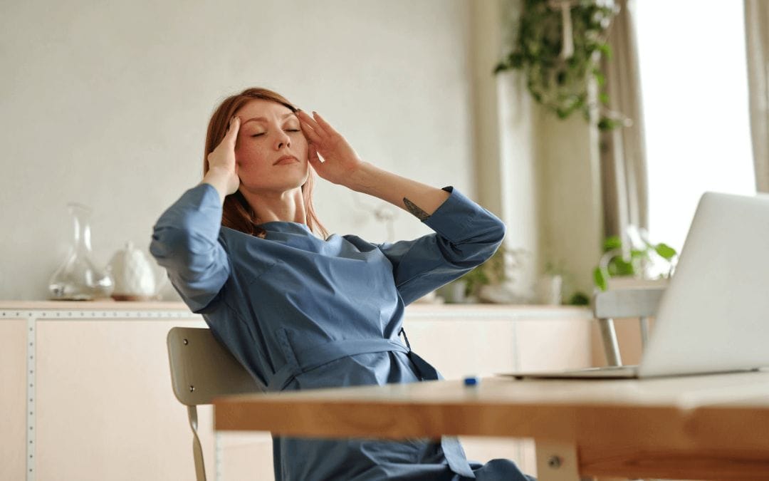 woman with headache or migraine pain