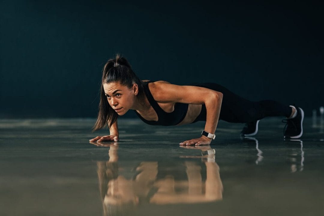 woman completing the zero to first push-up program